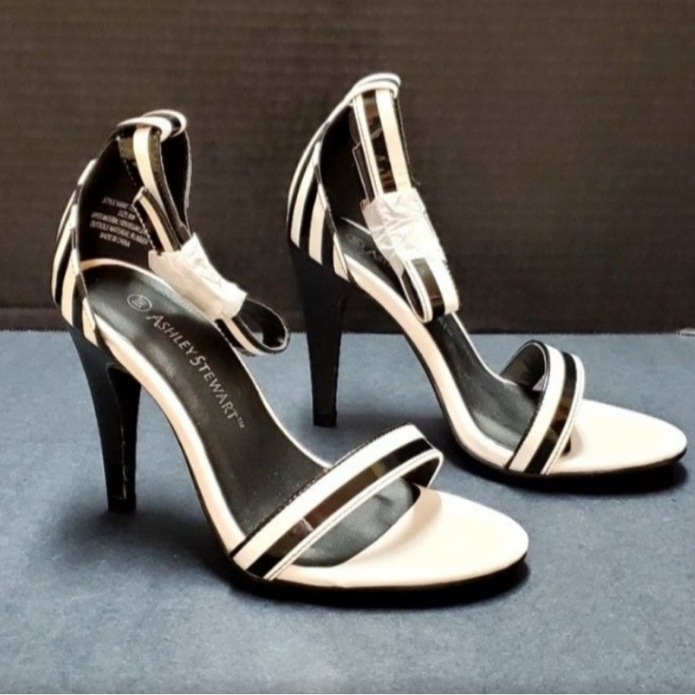 Ashley Stewart black and white striped open-toe heels with an ankle strap.